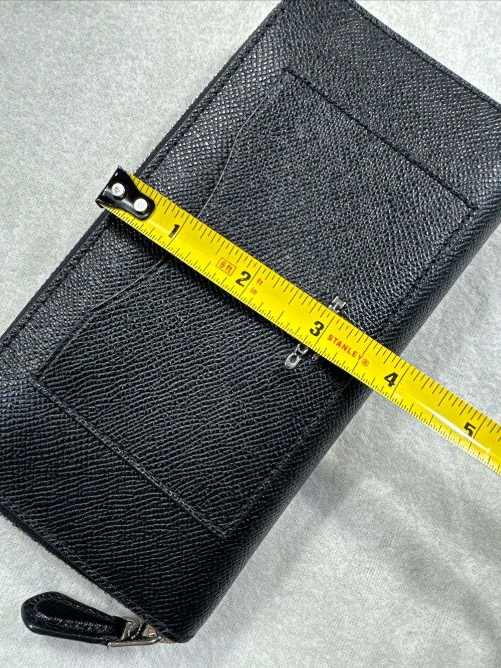 Coach sleek zip